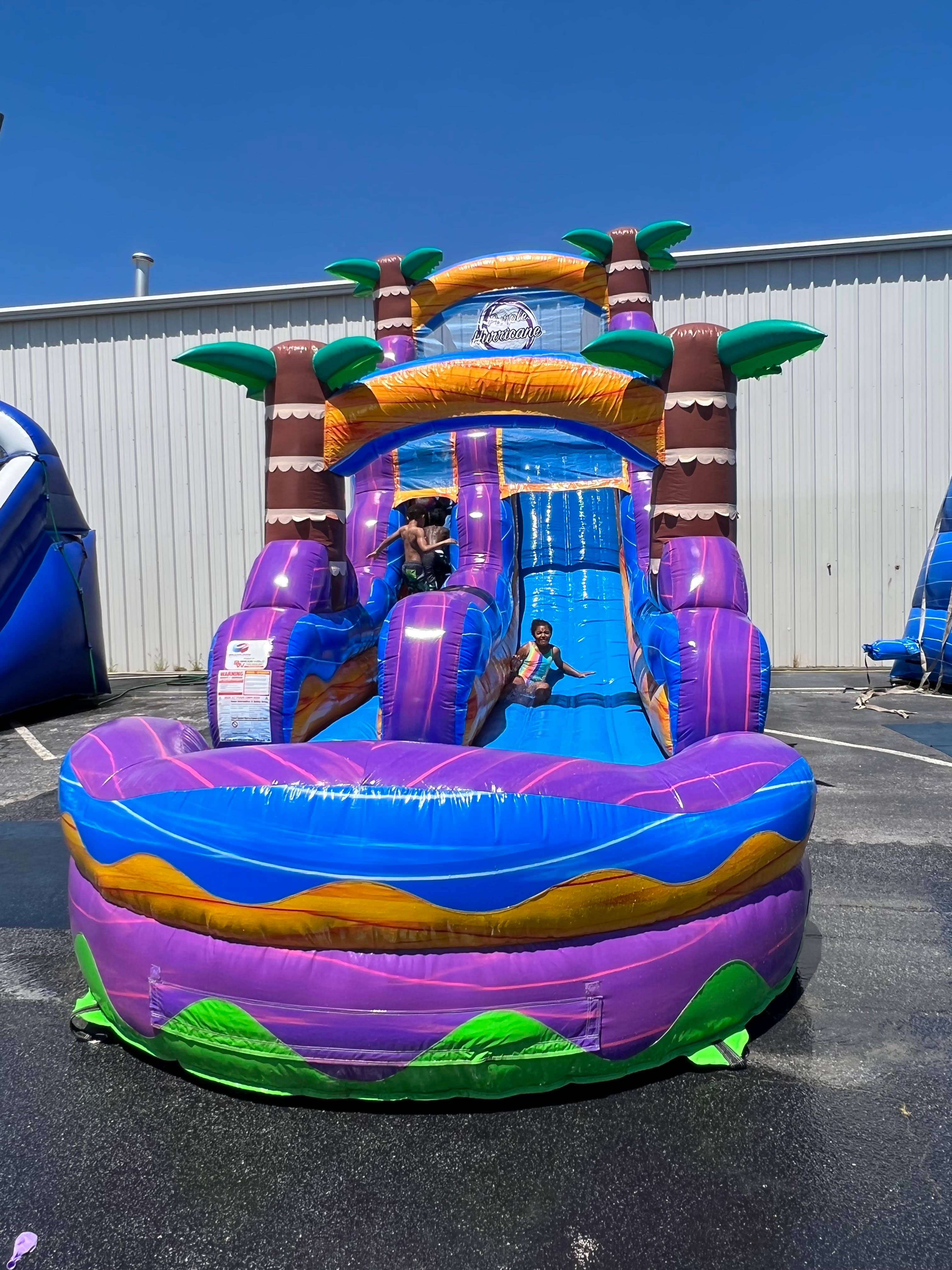 Purple Hurricane 18ft waterslide rental from Jumping Jax