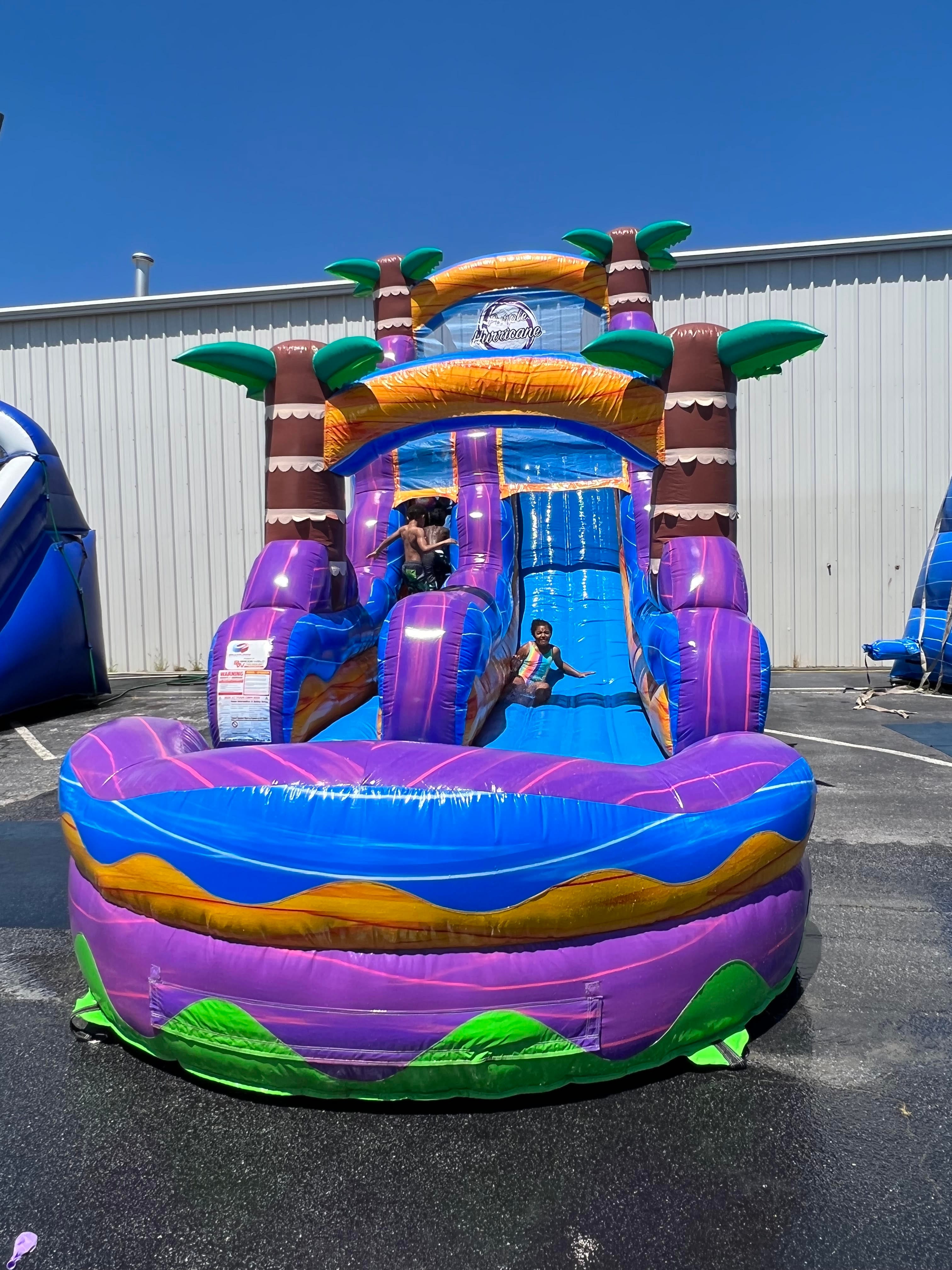 Purple Hurricane 18ft waterslide rental from Jumping Jax